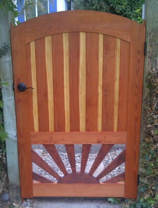 Arched Redwood Gate with Sunburst Pattern by Companion Woods Inlay at CustomMade.com