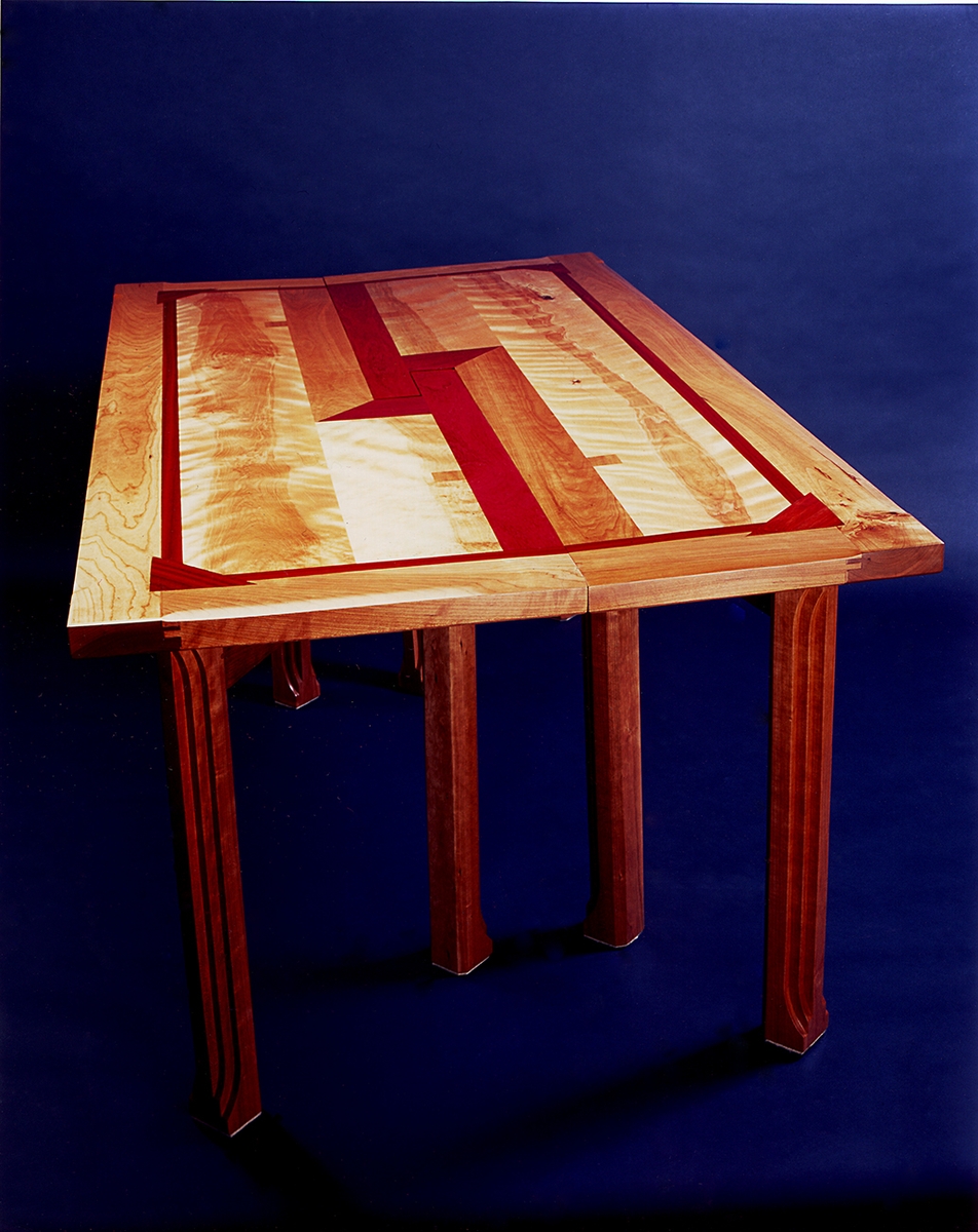 LCuISLUZS0mcHs63b1wk_Table-with-Eight-Legs-by-Burgeonwood-Inc.-at-CustomMade.com_.jpg